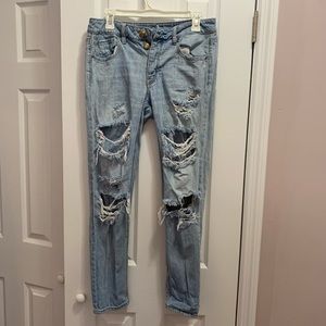 Size 4 Ripped light skinny jeans from AE